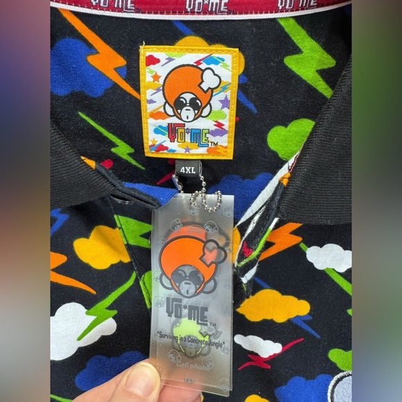 YO ME .Dynamic Black and Orange Polo Shirt with Geometric Pattern - Picture 7 of 7